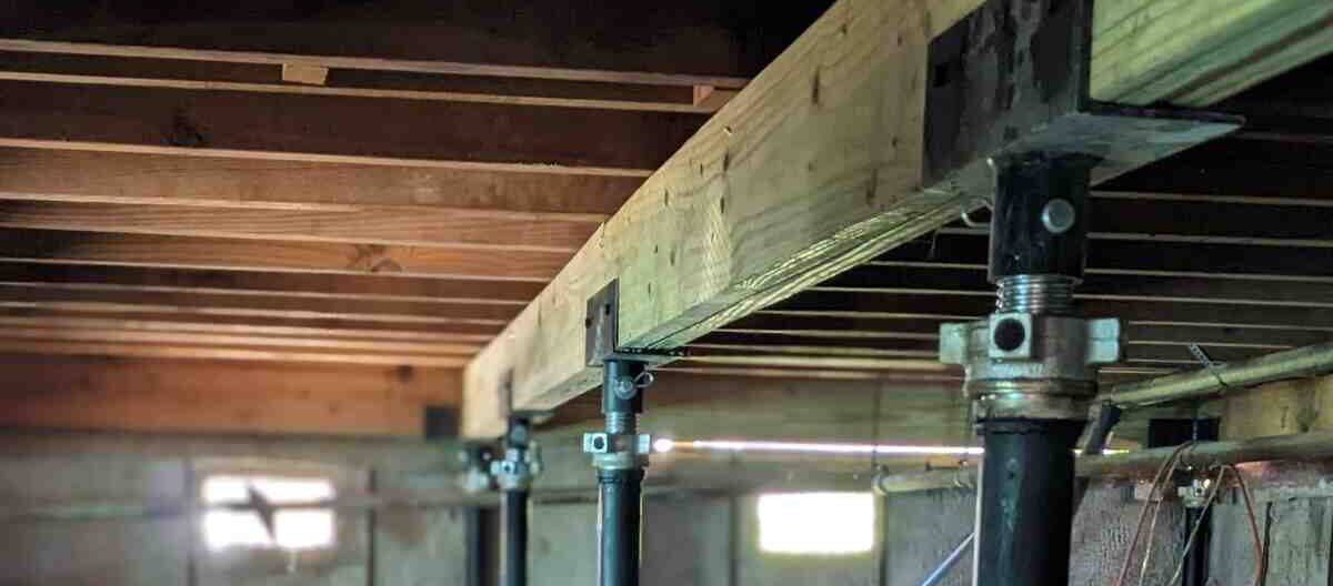 Quality Foundation Repair Austin installing Adjust-A-Piers to support a new beam under a pier and beam home.