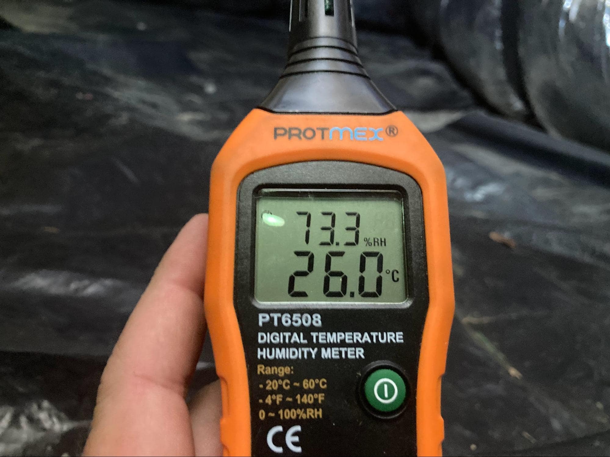 Ground Up Foundation Repair, Waterproofing and Concrete Leveling inspecting high humidity levels with a digital meter in a cr