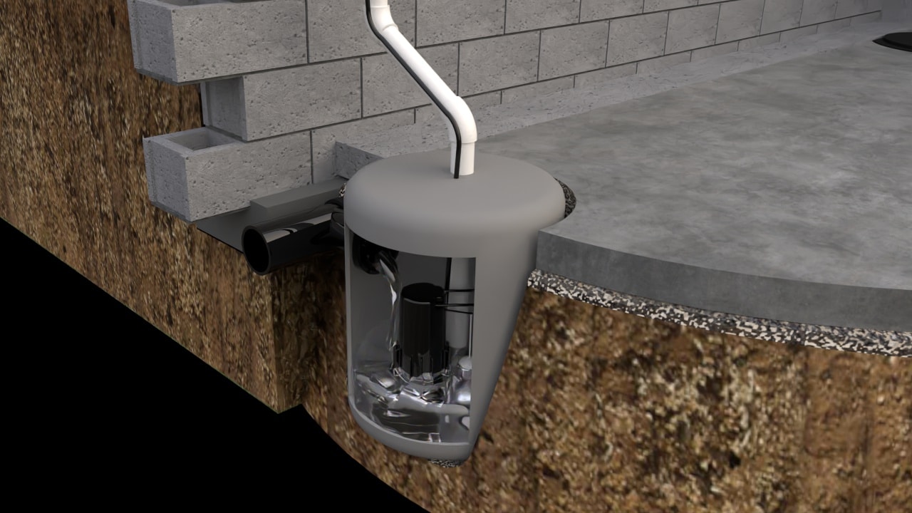 Ground Up Foundation Repair, Waterproofing and Concrete Leveling installing a sump pump and drainage system in a basement.