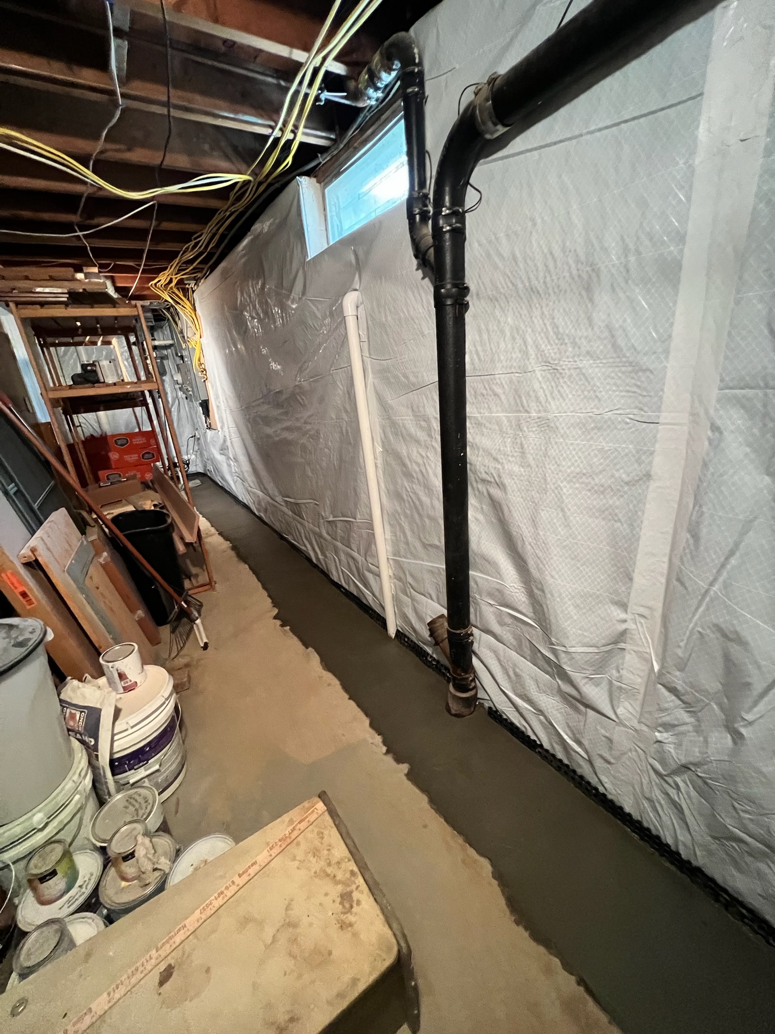Foundation settlement repair completed to level an uneven floor in a Maryland home