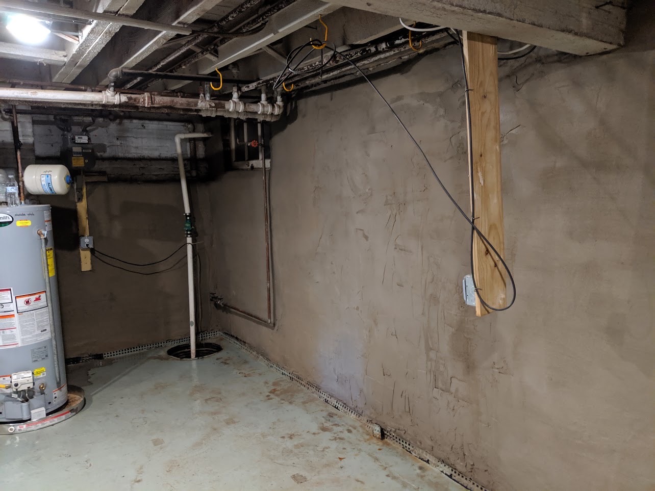 Foundation settlement repair completed to level an uneven floor in a Maryland home
