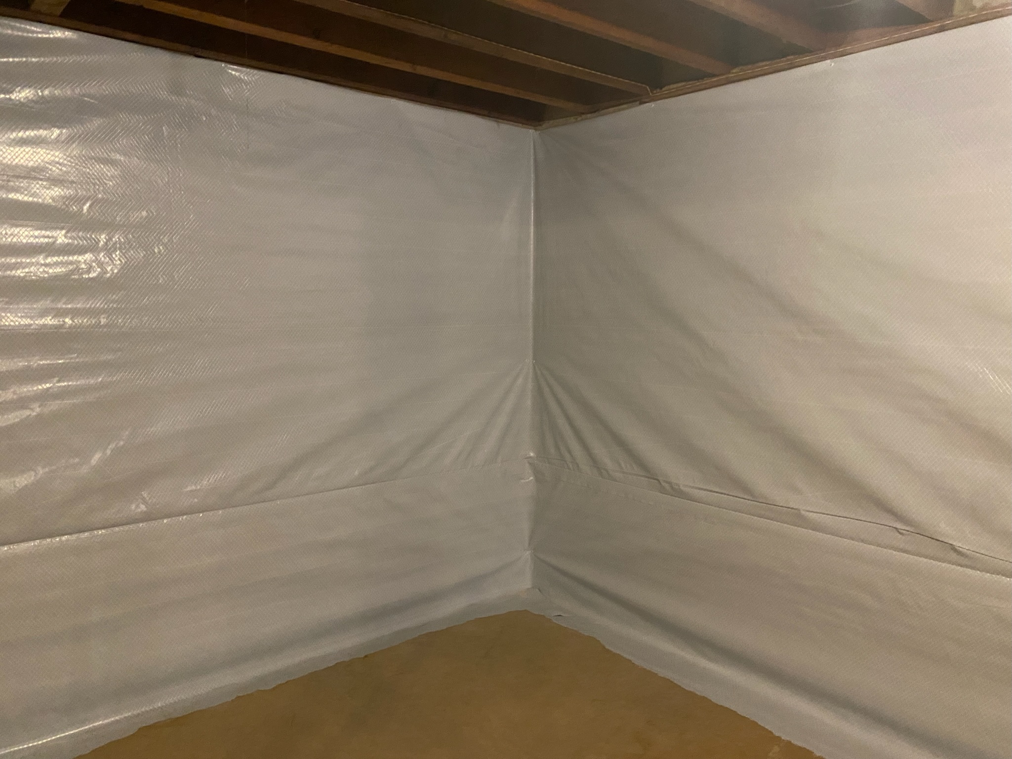 Insulation replacement in a crawl space