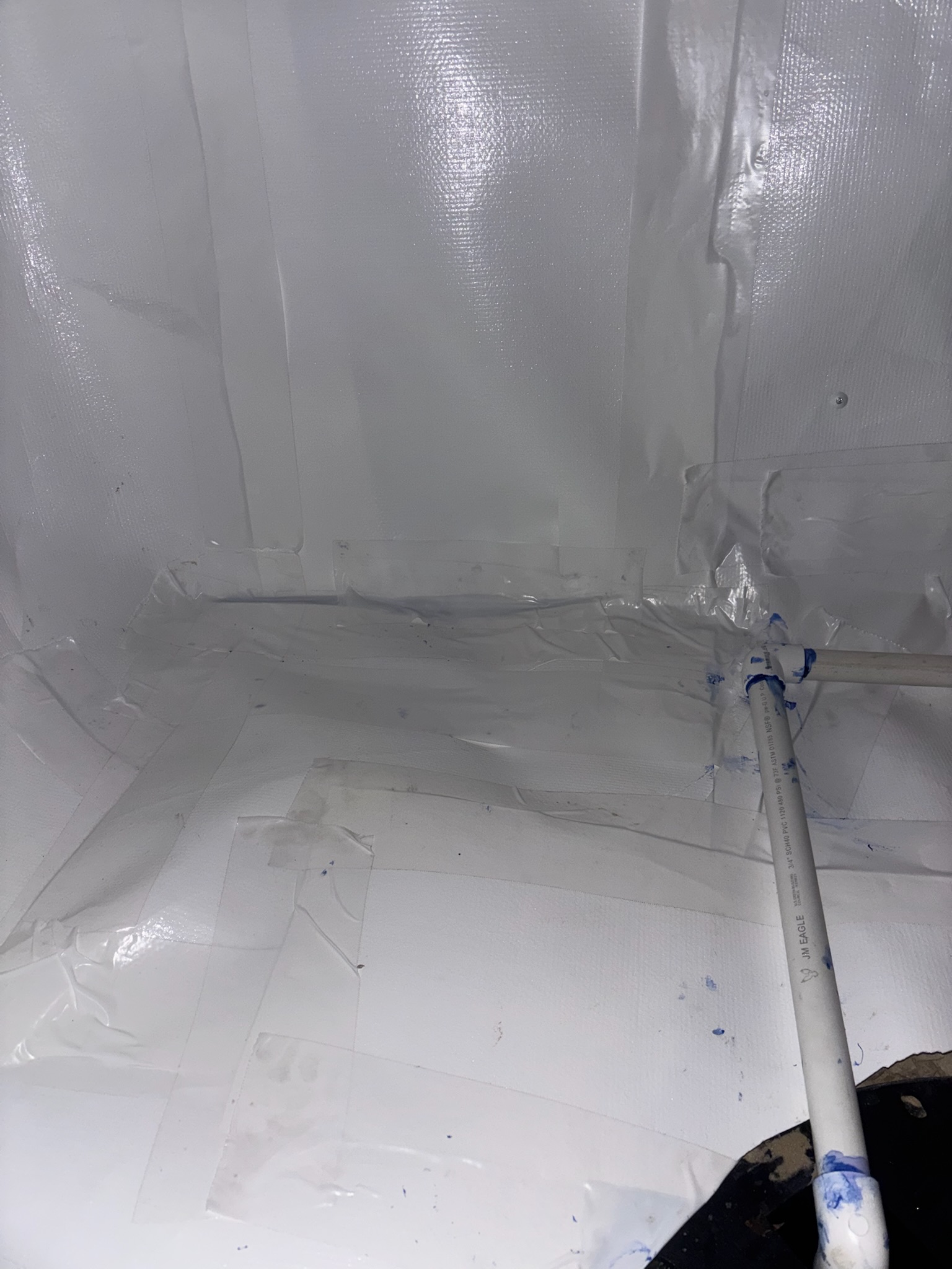 Vapor barrier and moisture control installed near a settled foundation section in a Maryland home