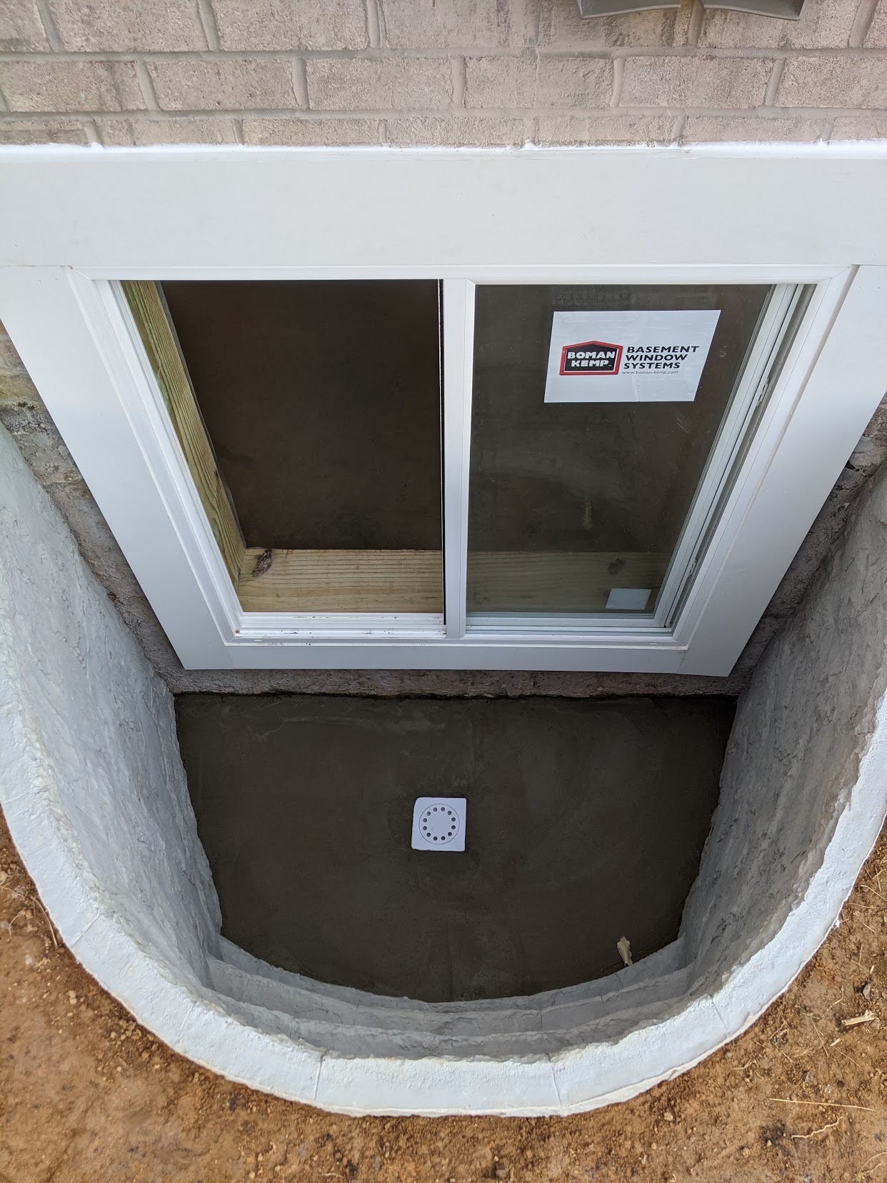 Egress window replacement completed in a Maryland basement