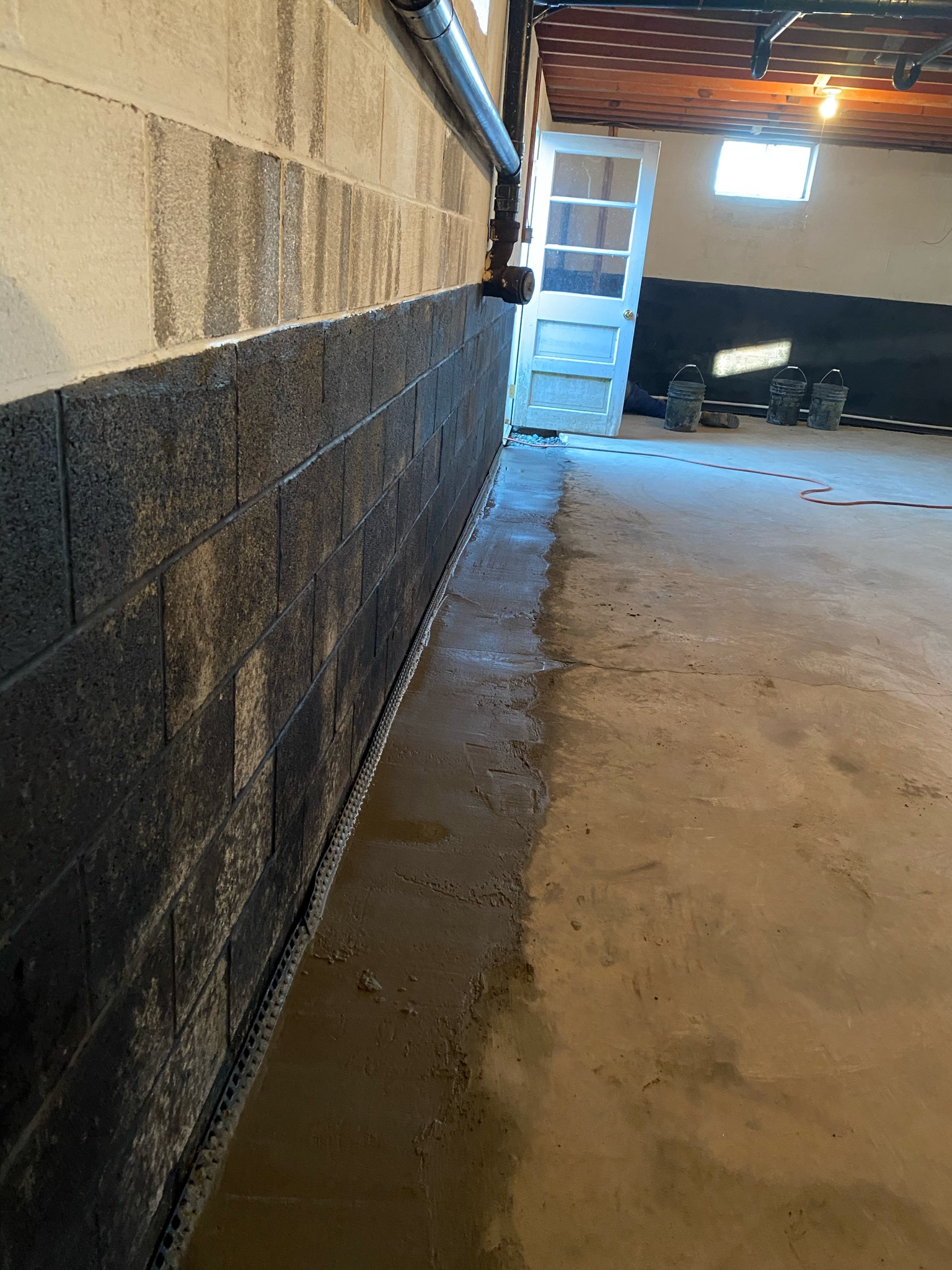 Sagging floor repair completed with support jacks in a Maryland home