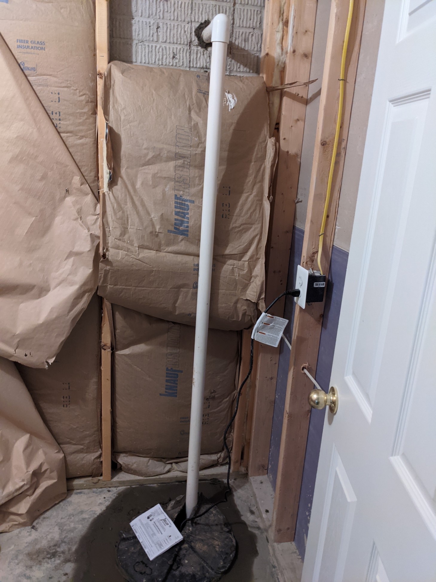 Oriole Basement Waterproofing installing a sump pump to manage basement water and moisture.