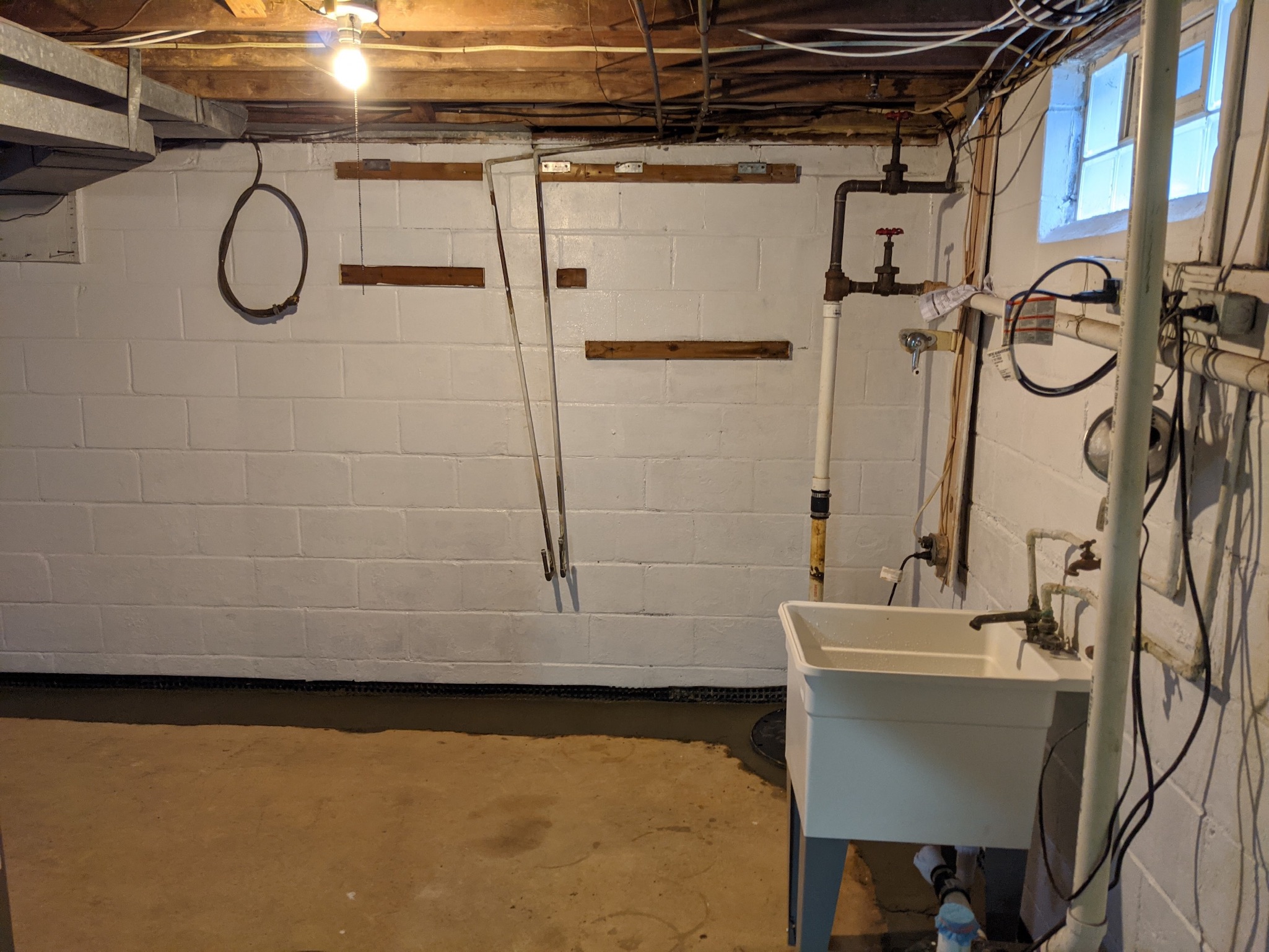 Sump pump installation completed in a Maryland basement