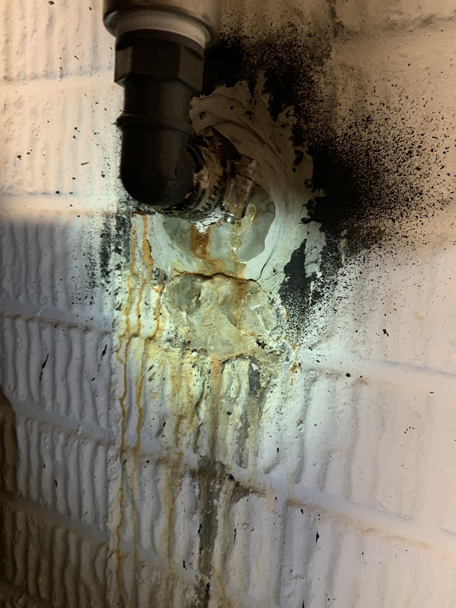 Severe water damage in basement from leaking foundation wall crack