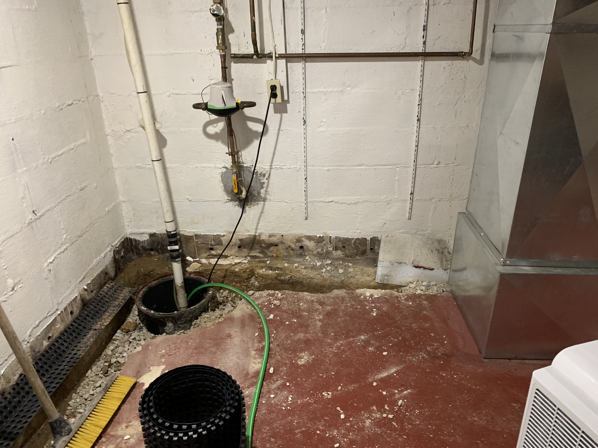 Sump pump repair completed in a Maryland basement