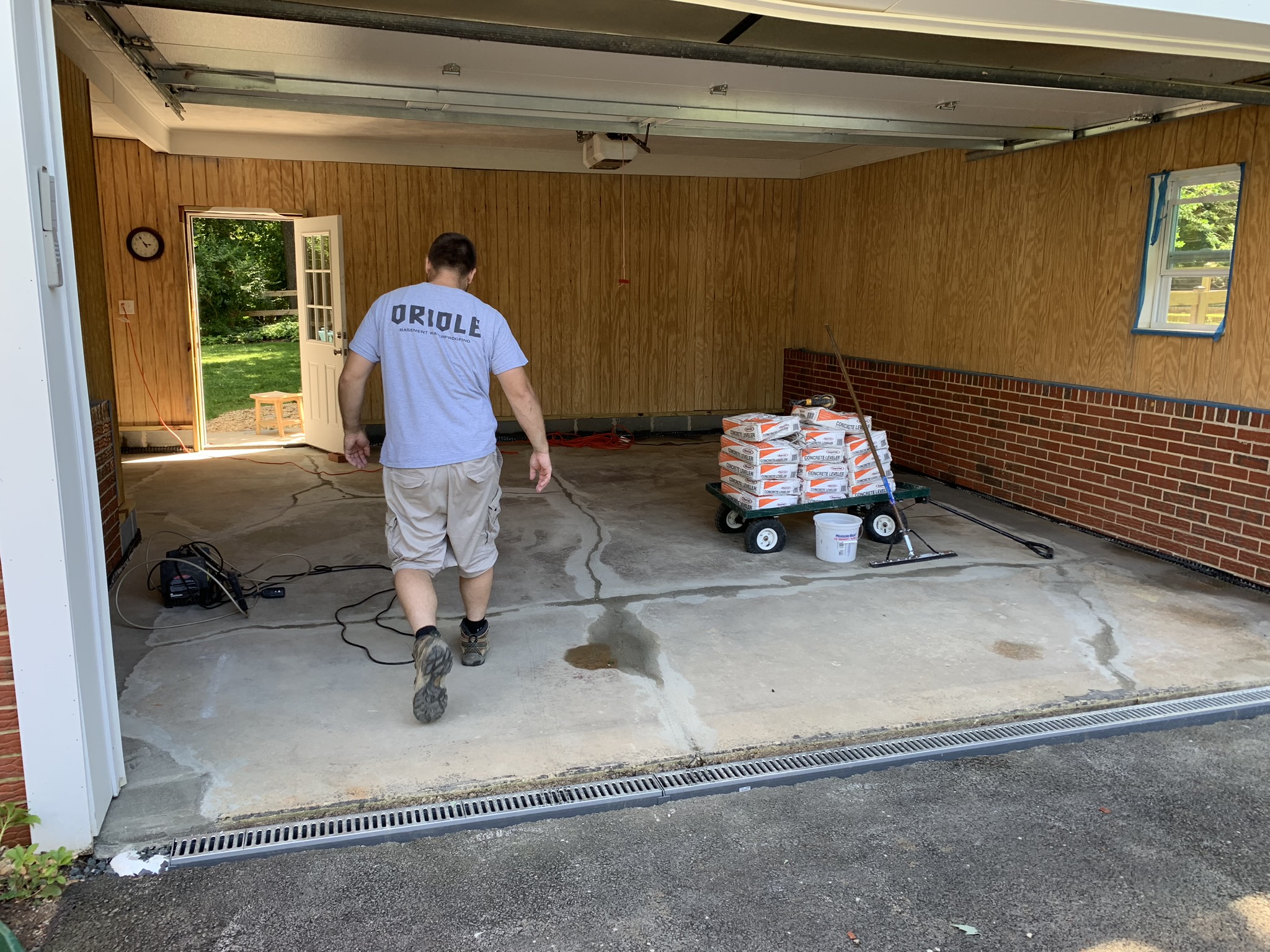 Oriole technician walking the slab and foundation before assessment