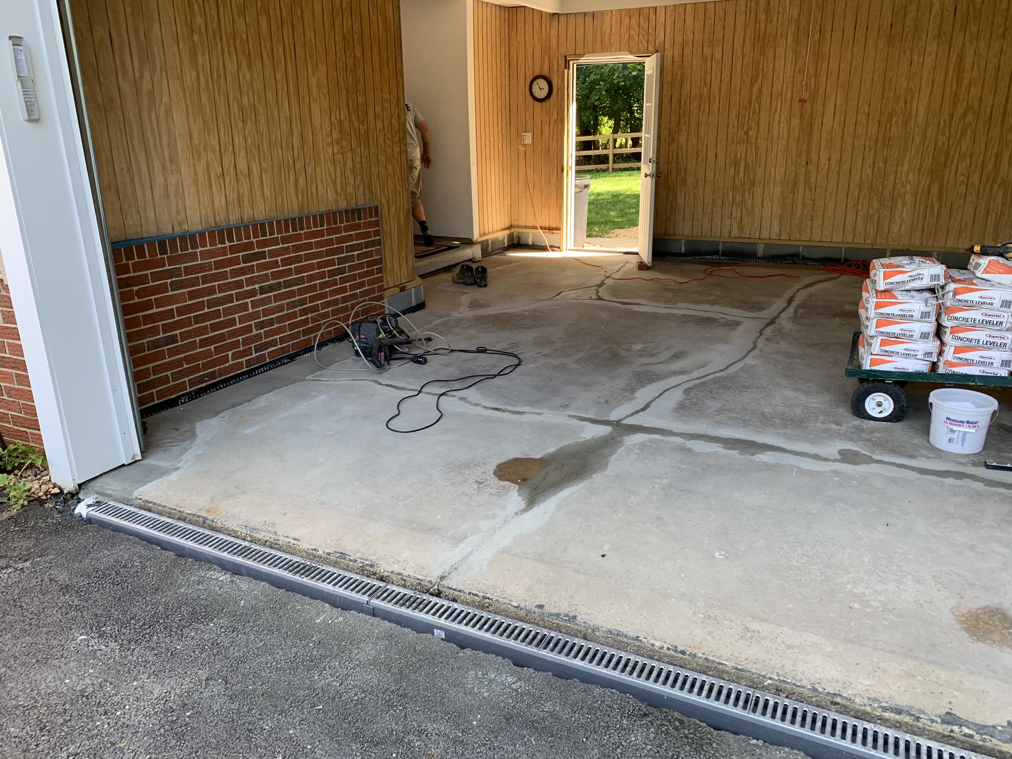Trench drain cut into a slab to correct drainage