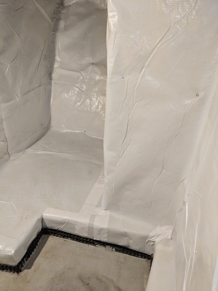 Interior drainage and wall treatment in crawl space