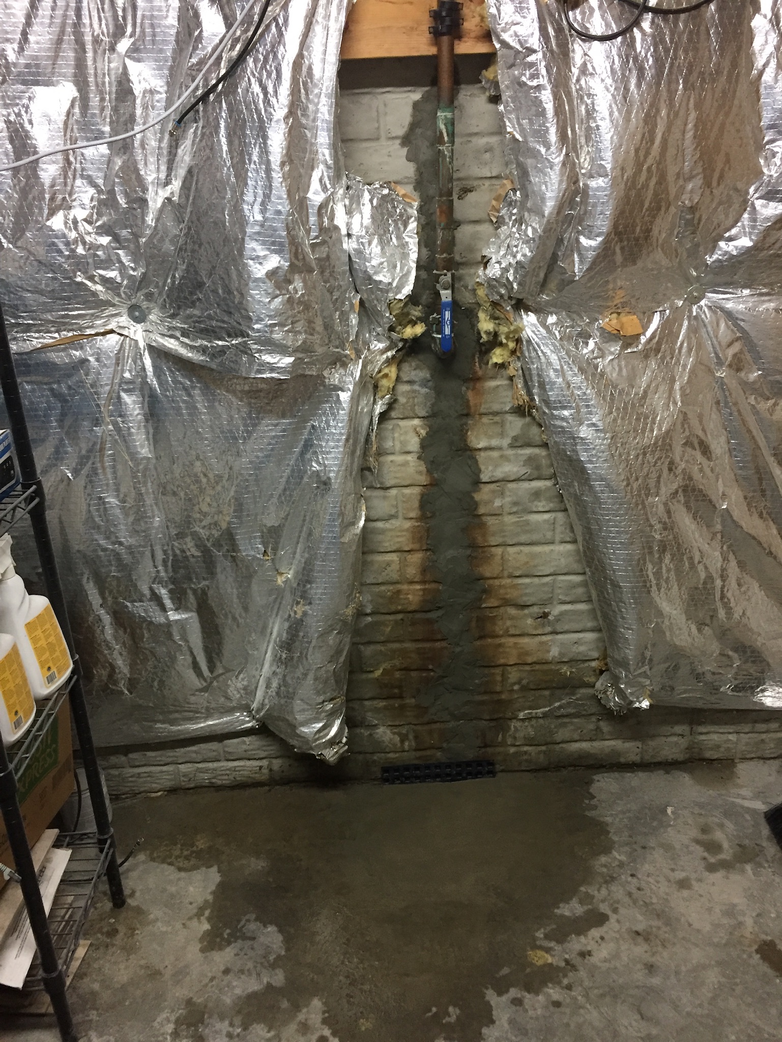 Foundation crack repair completed to resolve a door latch alignment issue in a Maryland home