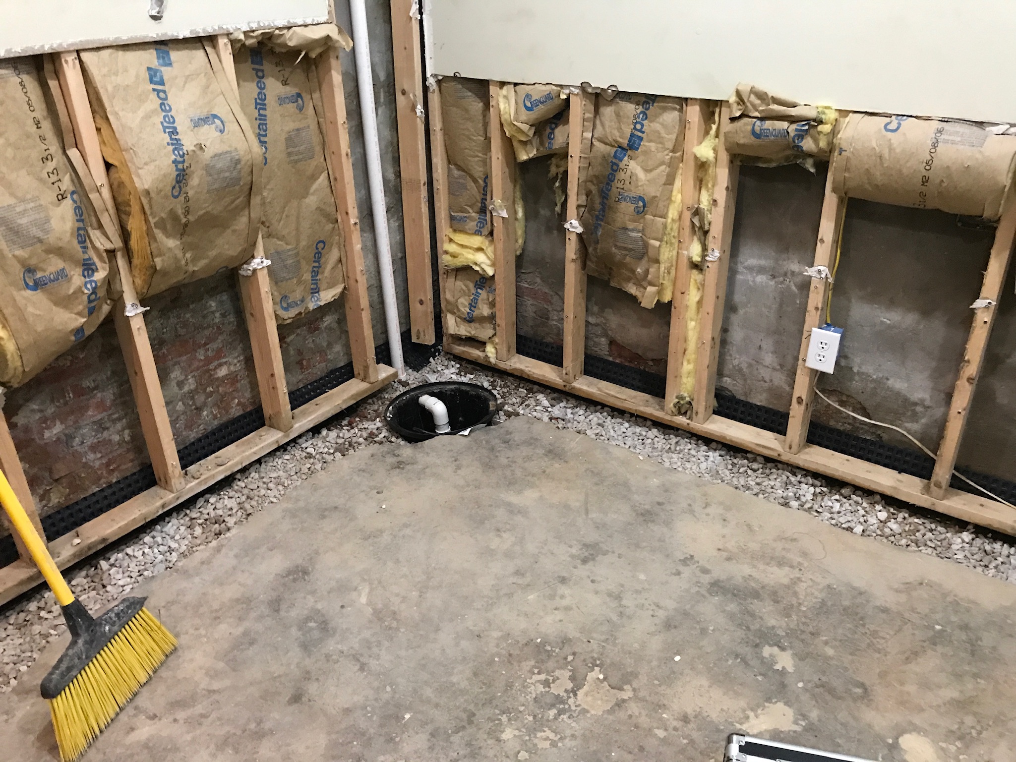 Crawl space encapsulation system with sump pump, drainage, and vapor barrier