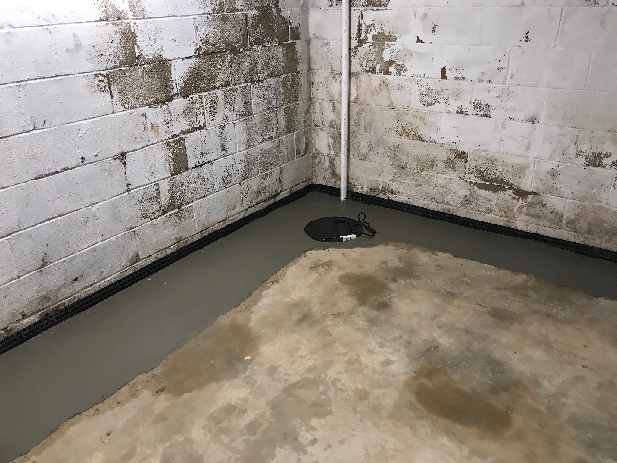 Sump pump installation completed in a Maryland basement