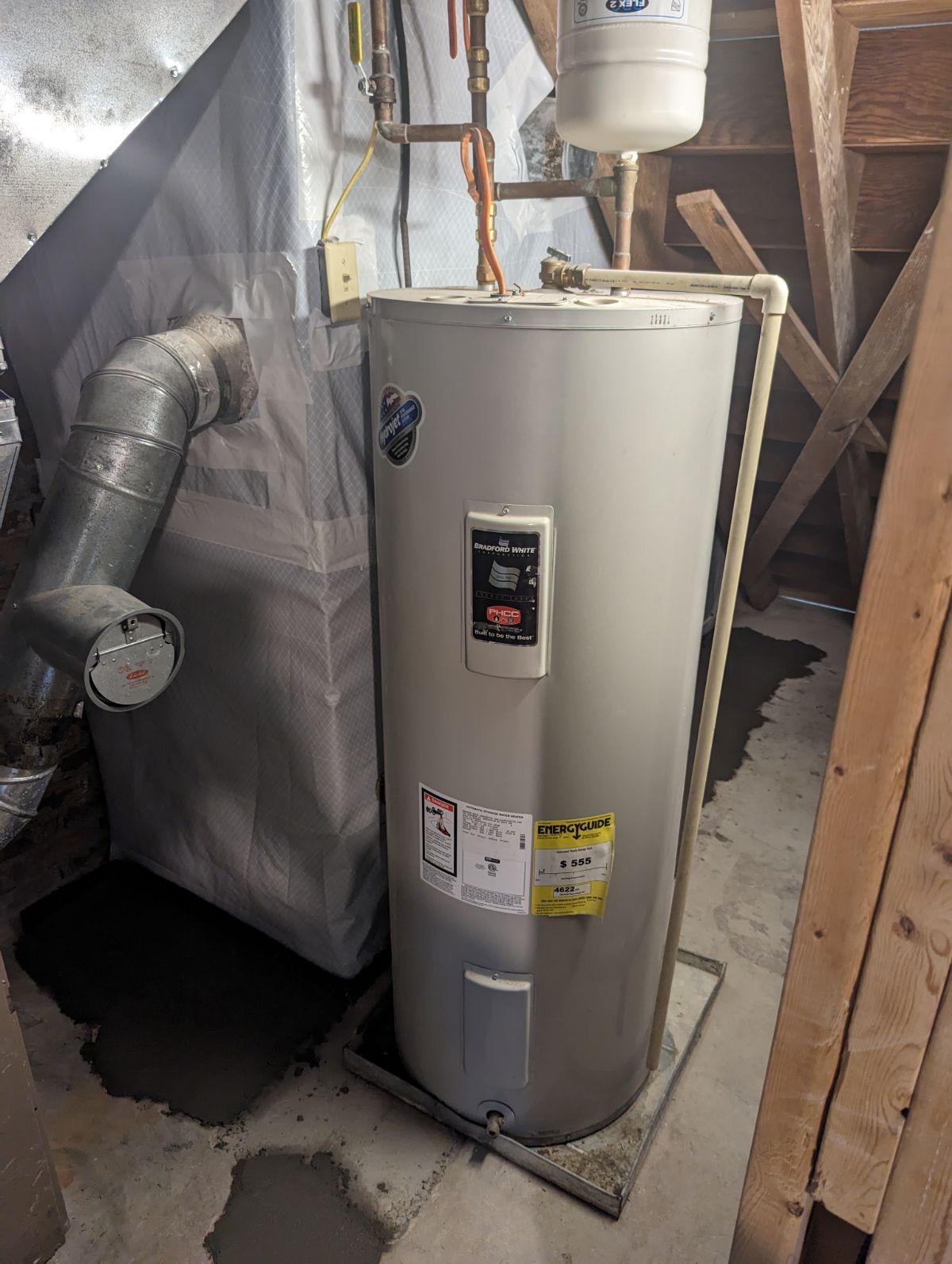 Liner sealed around a water heater flue and support column