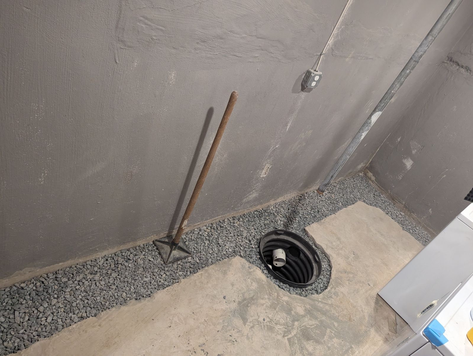 Sump pump and interior drainage system installation in Maryland basement