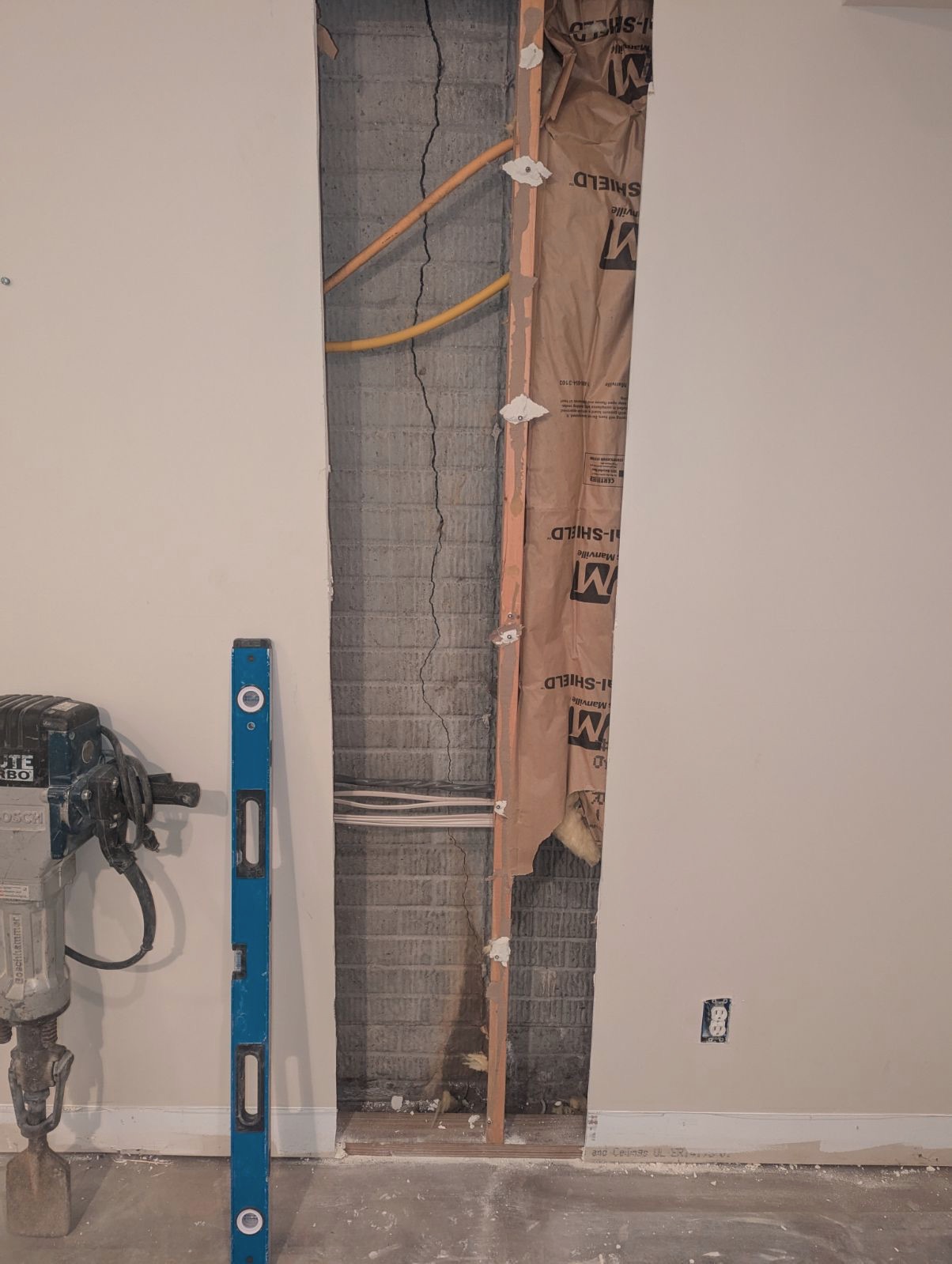 Crack measured with a level once the wall finish was opened up