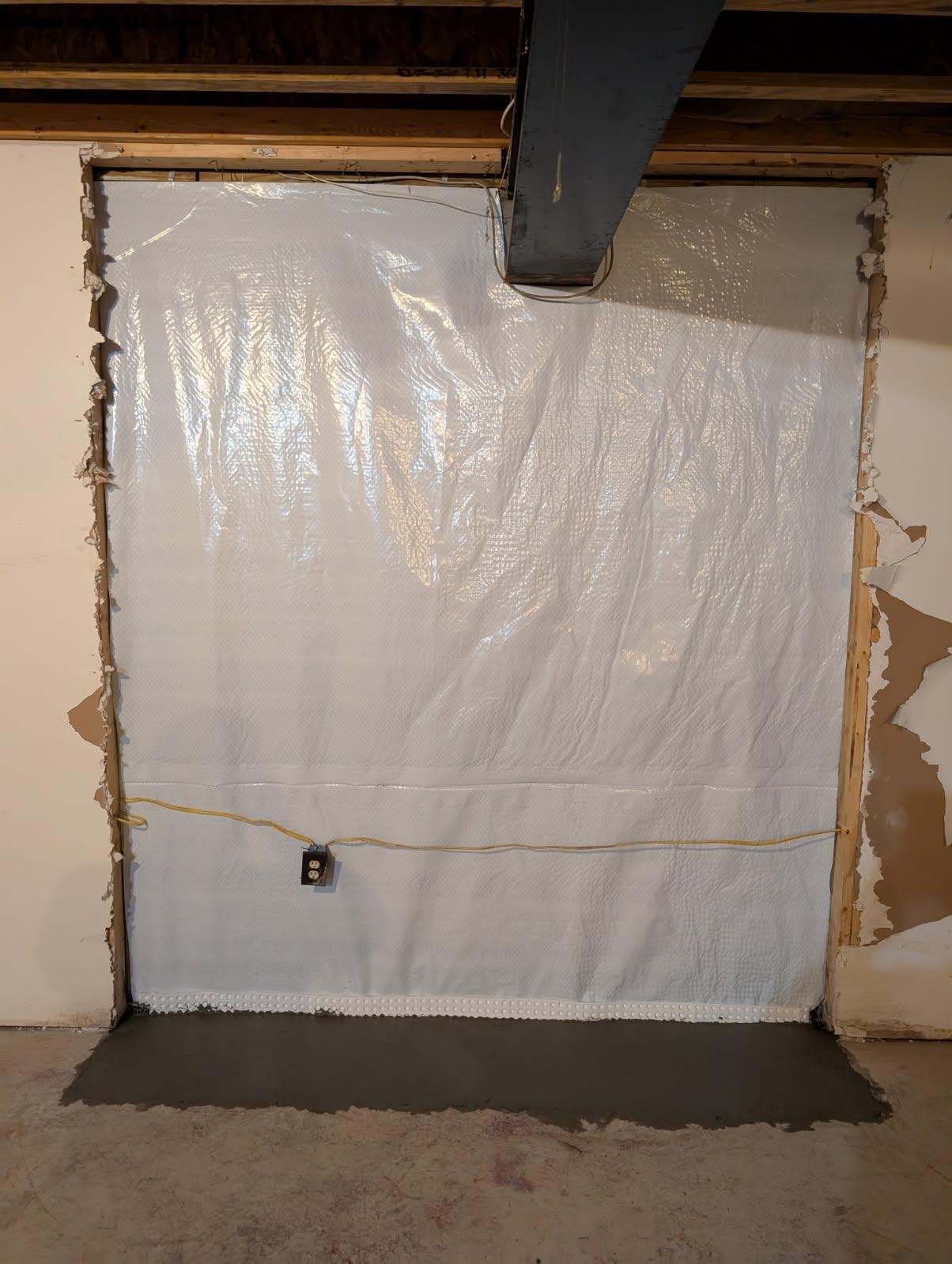 Encapsulated crawl space with a sealed liner and dry framing in a Maryland home
