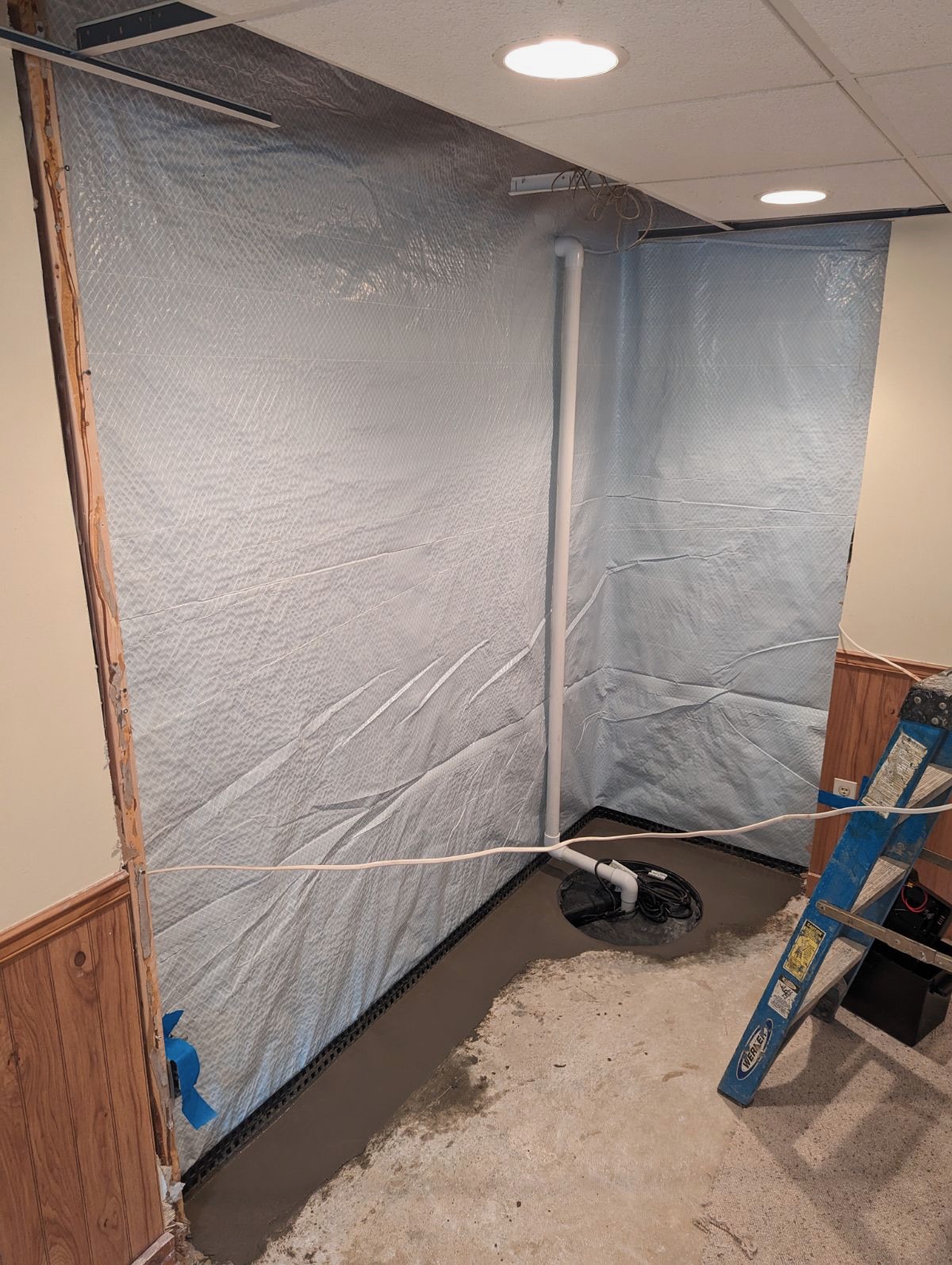 Completed liner in a crawl space corner