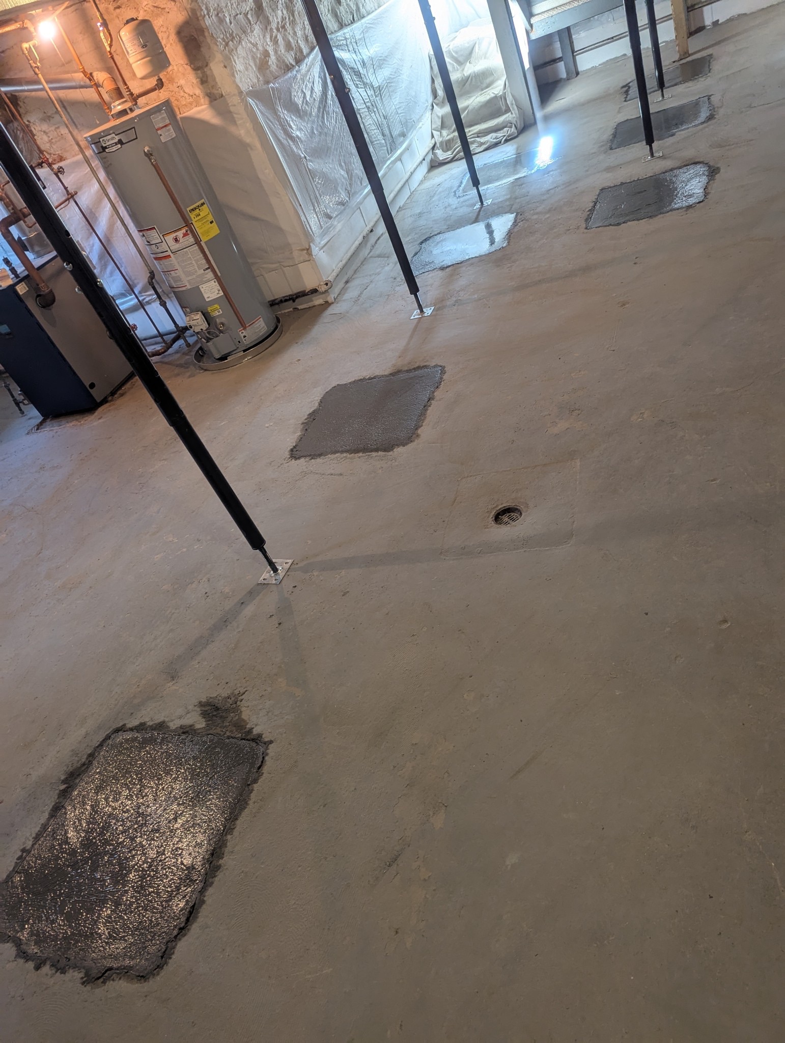 Slab cutouts patched and the floor restored