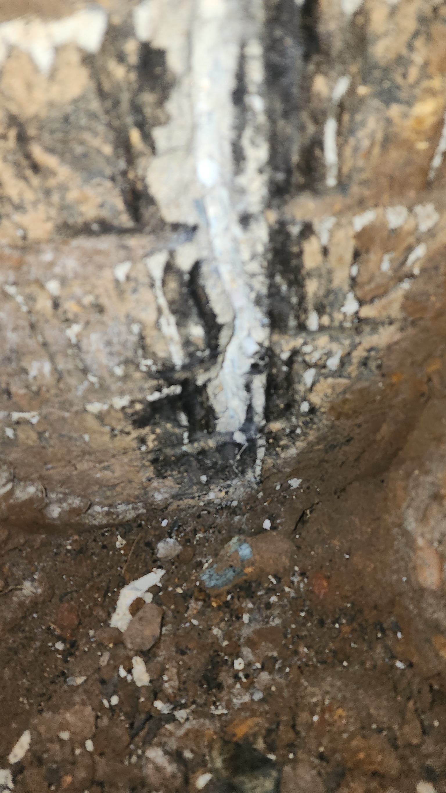 Structural crack in block foundation from slab movement and settlement