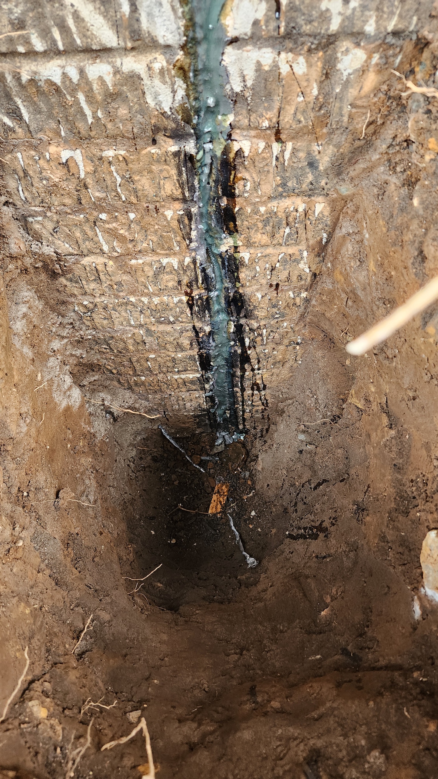 Epoxy repair of a diagonal foundation crack in a Maryland basement