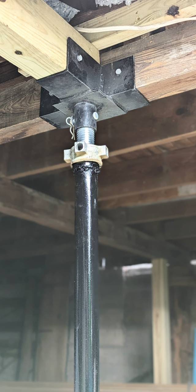 Quality Foundation Repair Austin installing a single Adjust-A-Pier to stabilize a crawl space.