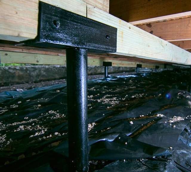 Quality Foundation Repair Austin Adjust-A-Piers and vapor barrier during crawl space repair.